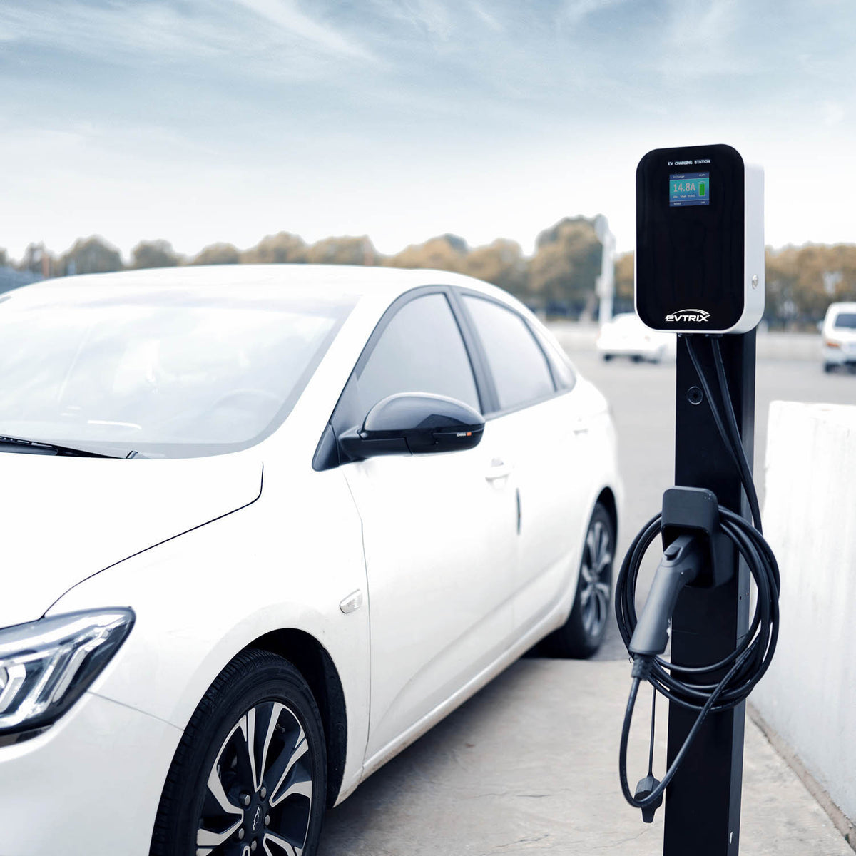 OCPP EV charging station charging a vehicle at a commercial property
